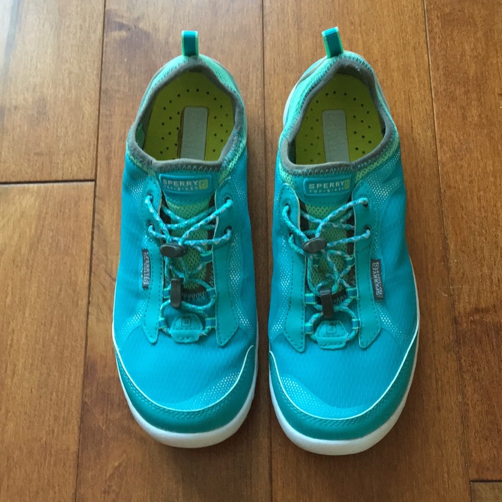 Sperry sneakers.